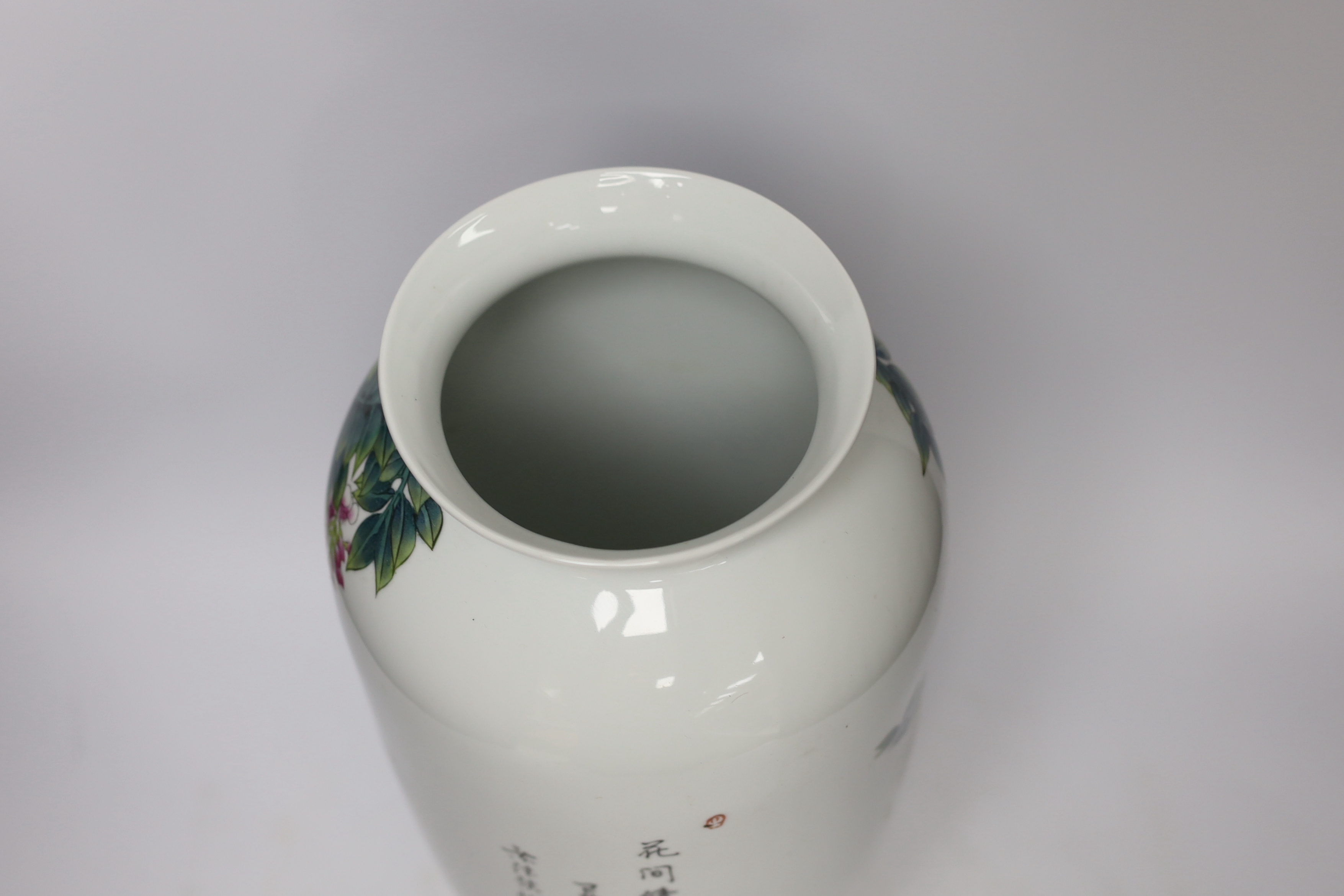 A boxed Chinese famille rose vase with wisteria decoration on hardwood stand, vase 43cm